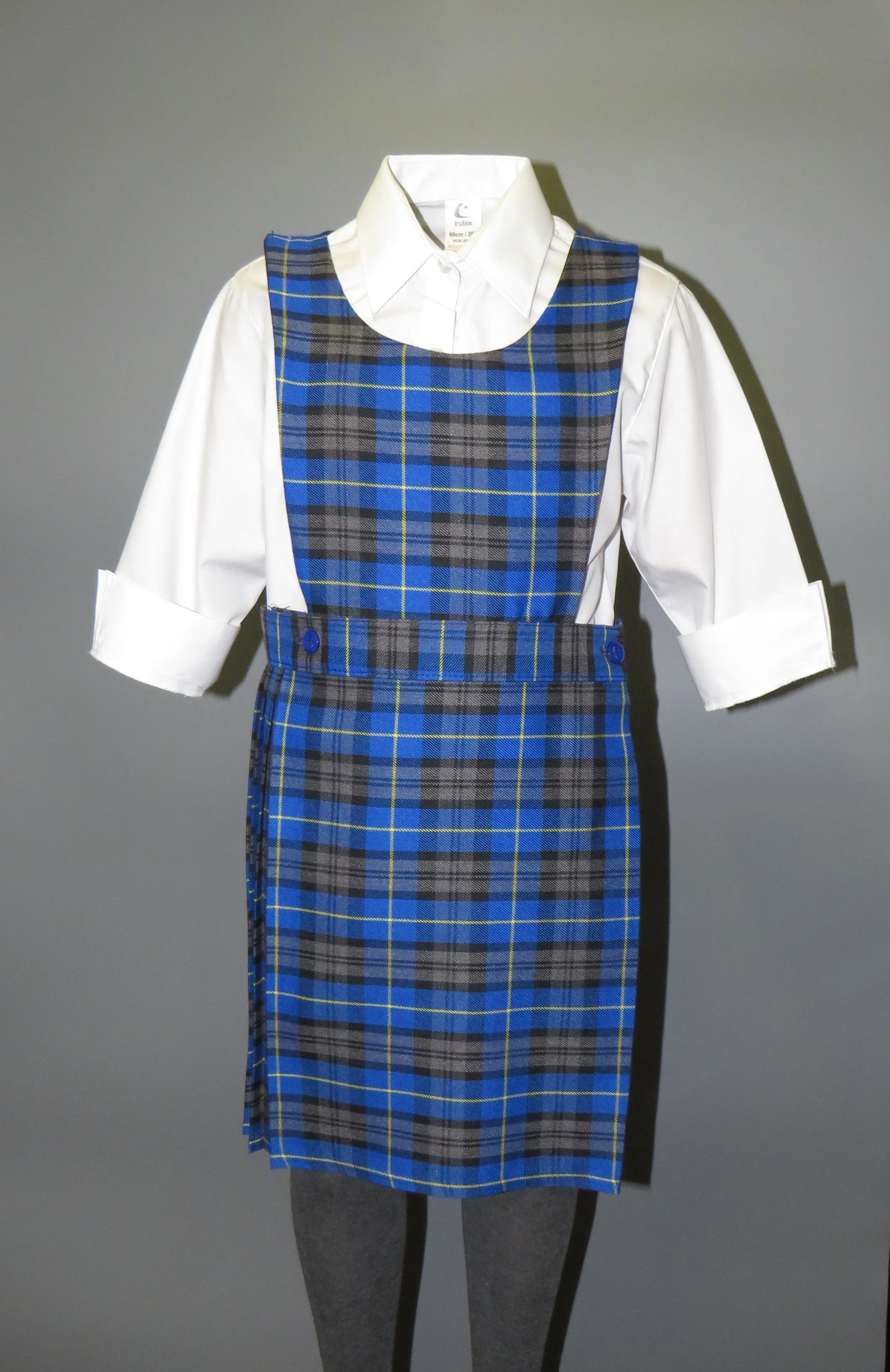 Girls school bib tartan pinafore with button detail - Quality school uniforms at the School Clothing Company